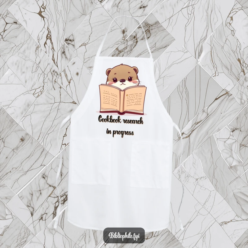 Funny apron showing a curious otter peeking from a novel, bringing humor to cooking and kitchen activities.