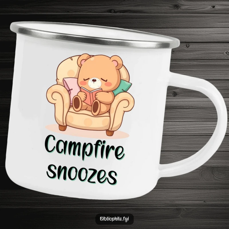 Funny Sleepy Bear Camping Mug with a sleepy bear character curled up on a comfortable armchair made of pillows, reading, great for camping.