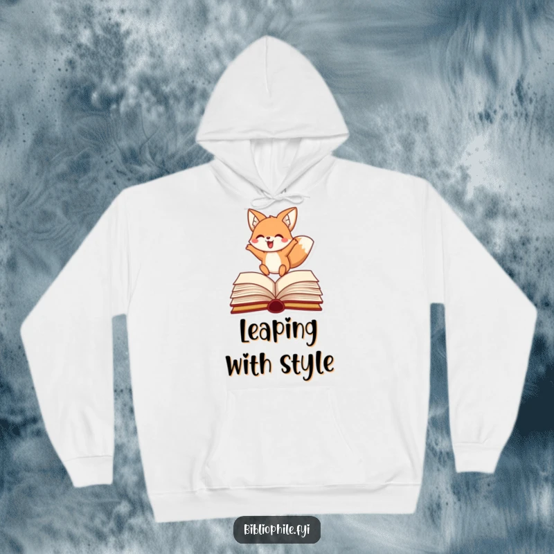 Funny fox hoodie featuring a happy character mid-leap over an open book, cozy literary fun.