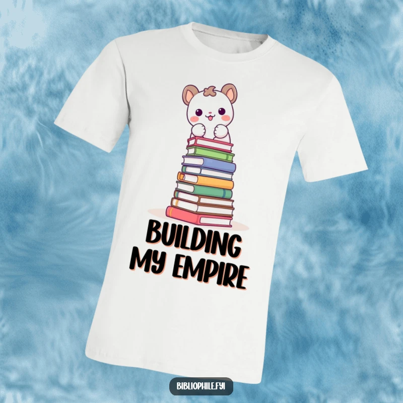 Funny t-shirt featuring a cute animal character gleefully stacking books into a tower, symbolizing literary ambition.