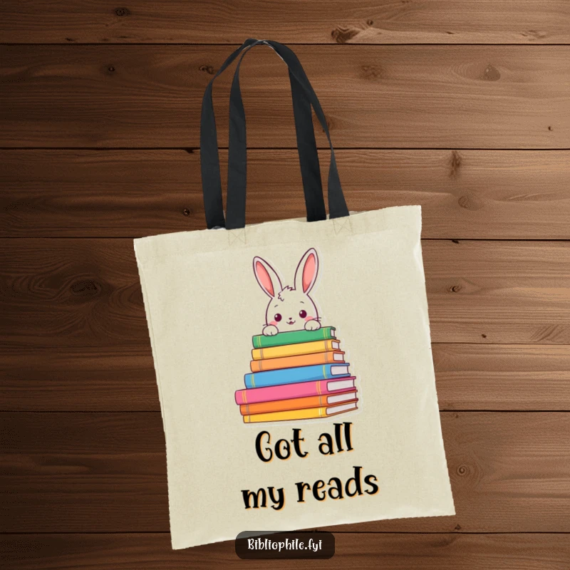 Funny rabbit peeking from book stacks on a tote bag, showcasing curiosity and a love for books, a great funny gift.