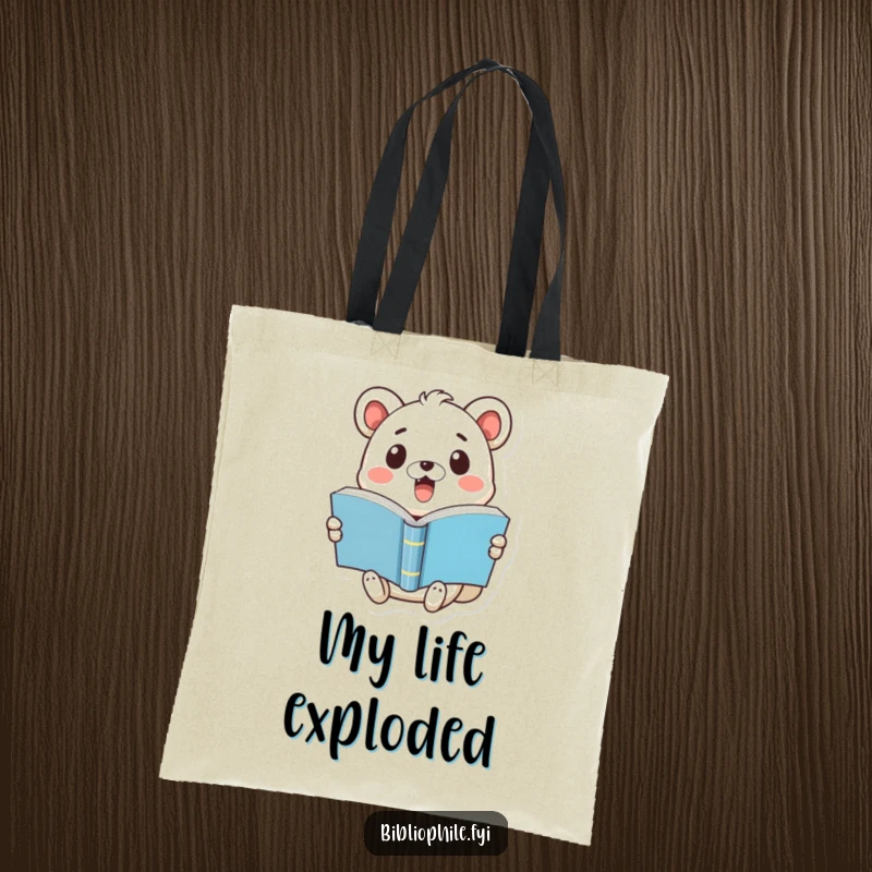 Funny tote bag with a cute animal displaying surprise while holding a pop-open book, great for carrying books and more.